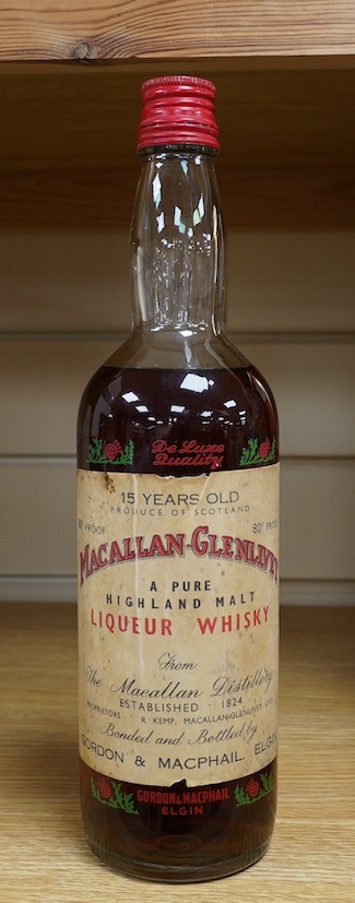 A bottle of 15 years old Macallan-Glenlivet liqueur whisky from the Macallan Distillery. Condition - fair to good, some wear to label